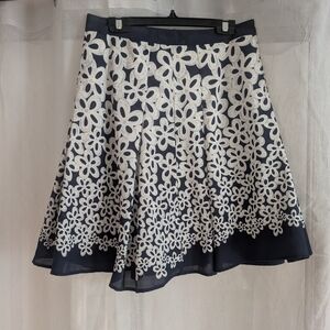 Ricki's Navy Skater Skirt with White Floral Pattern A-line